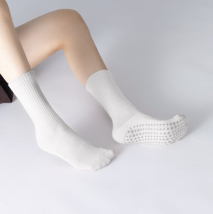 Stay balanced with full-toe grip socks for Pilates, Yoga, and Barre. Non-slip design, arch support, and breathable organic cotton for comfort.